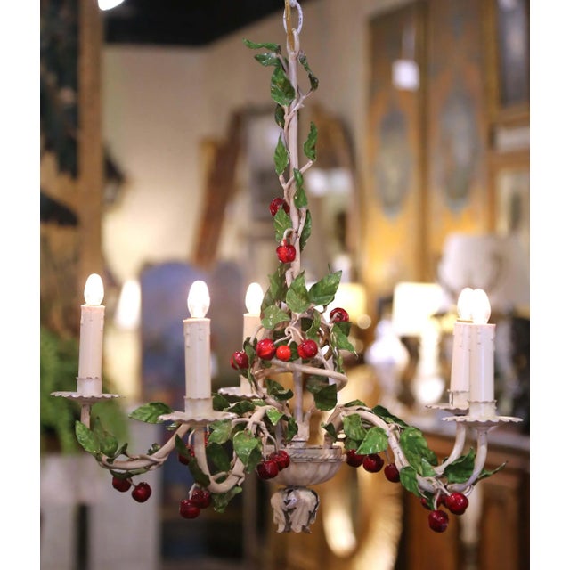 Bring a touch of French countryside charm to your kitchen, breakfast nook, or sunroom with this whimsical chandelier....