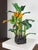 A mid-century hand-carved wooden sculpture depicting a lush banana tree Crafted in South America, this vibrant folk art...