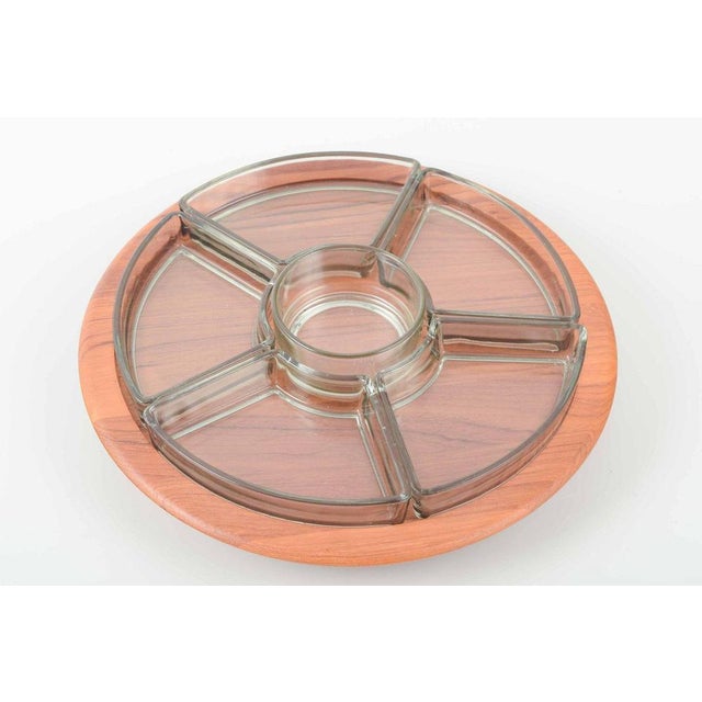 Cabaret tray in teak with eight hand-blown glass dishes. Manufacturer: digsmed, denmark material: teak and glass...