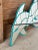Vintage Coastal Florida twin dolphin wall mirror on a teal wood background ready to hang with two hooks on the back....