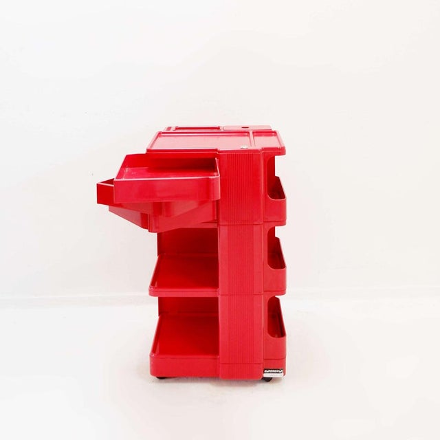 Organize trolley - Vintage - decoration Measures : 42,5x41cm H:75,5cm Elegant red sideboard designed by Giovanni Pelis for...