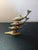 GORGEOUS Brass 6" stacked Dolphins on Wave crest Figurine The GORGEOUS Brass 6" Dolphins on Wave crest Figurine is a...