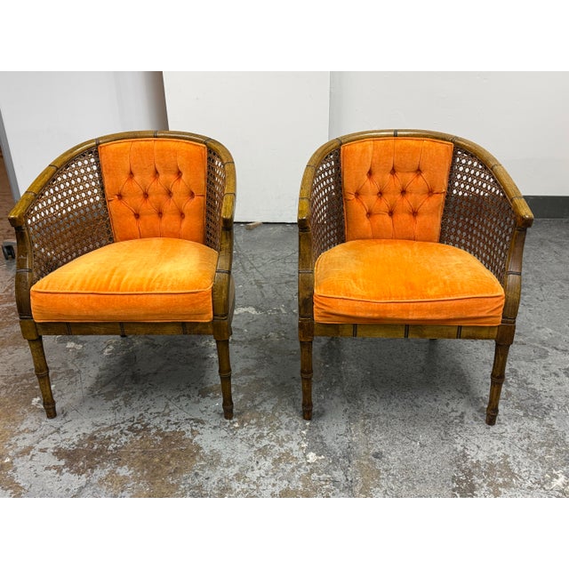 Design Plus Gallery presents a MCM Saffron Velvet Barrel Back Chairs with Cane. These chairs offer curved wood frames with...
