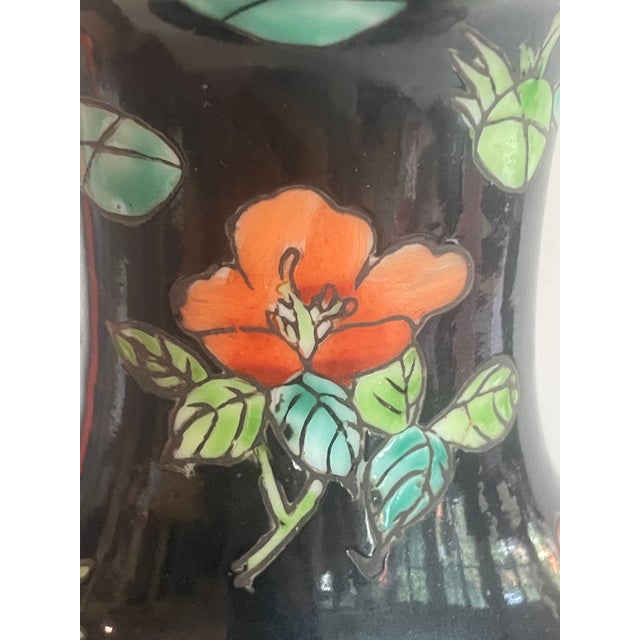 Famille Noire Chinese Vase from the late 20th Century. This piece is marked on the base: it is Jingdezhen porcelain from...