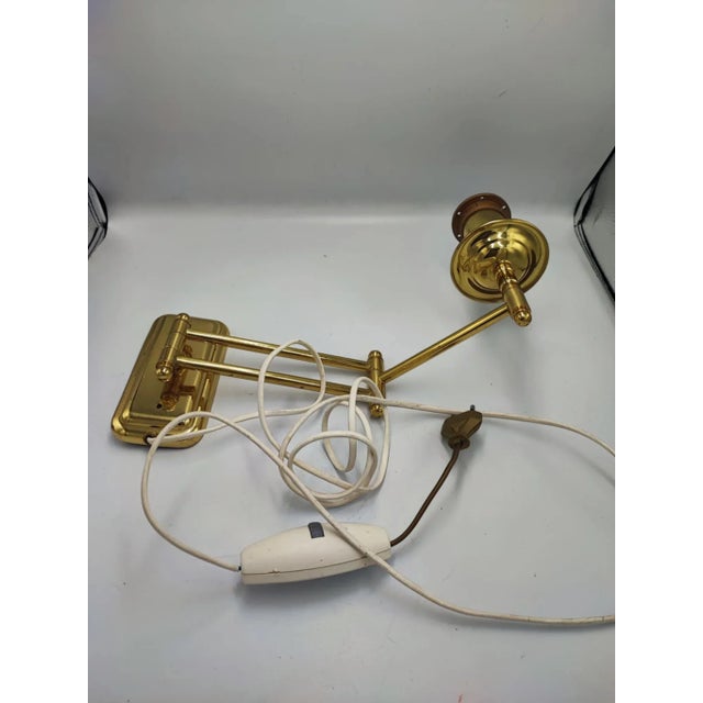 Wall lamp, brass, vintage 70-80s, dimensions height 22 cm, width 7.5 cm, depth 37 cm. European Plug (up to 250V).The...