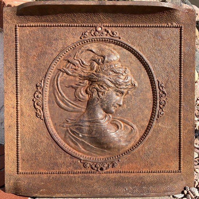 Antique iron fireplace fireback depicting a goddess. This piece was acquired from victorian house in an older section of...