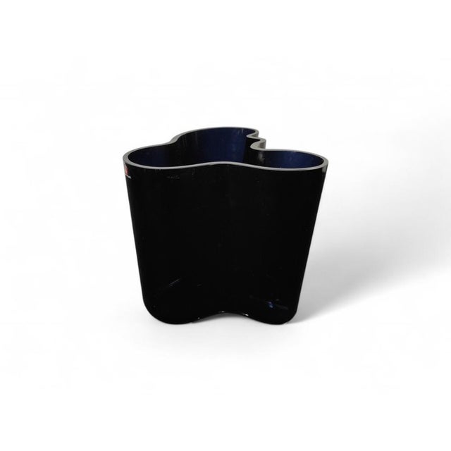 This is an iconic Aalto vase (also known as the Savoy vase), a masterpiece of Finnish design created by Alvar Aalto for...