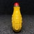 This is a charming vintage Chinese snuff bottle, made from a faux ivory or resin material and hand-carved with intricate...