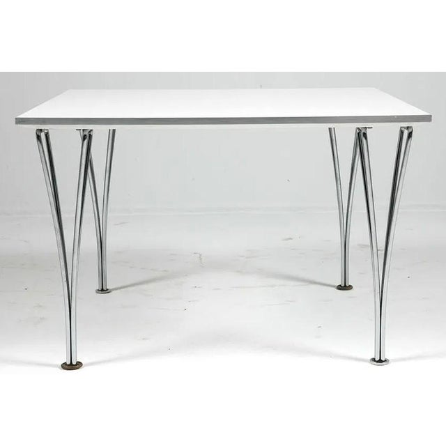 Fantastic ultra modern coffee table produced by Fritz Hansen (Denmark) and designed by Piet Hein and Bruno Mathsson. A...