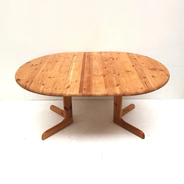 Vintage extendable pine dining table made in the 1970s. Dimensions: Length (extended): 149.4 cm Length (not extended): 104...