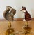 Two super cute glazed ceramics figurines of a squirrel ( Denmark) and red fox on brass bases as lamp finials.