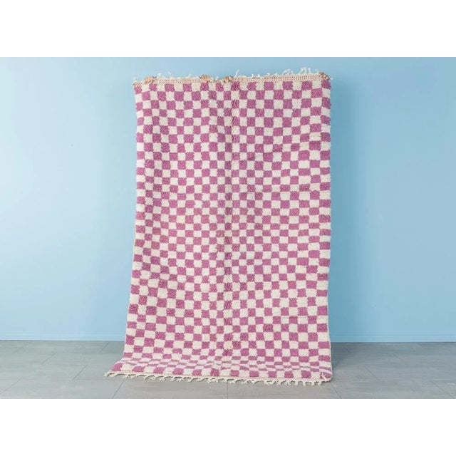 Berry Check is a contemporary Berber rug that consists of 100% high-quality Atlas wool - soft and cozy under your feet....