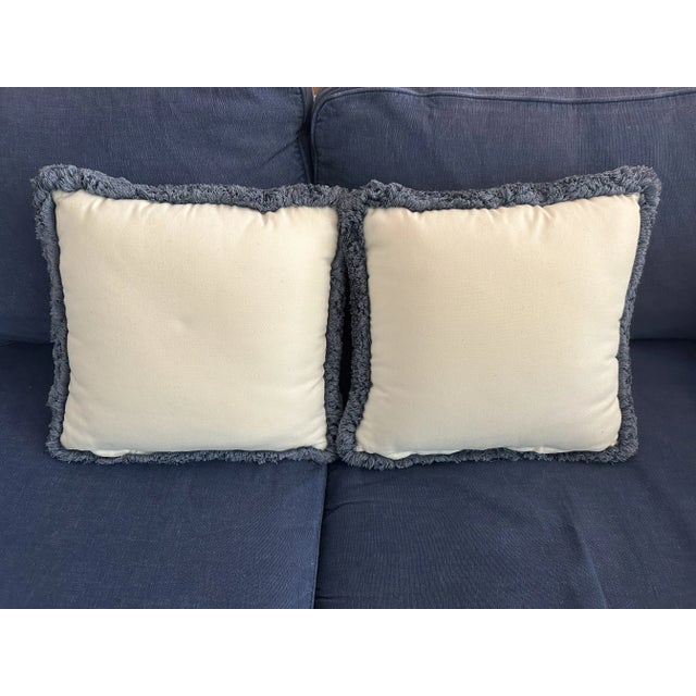 Set of two custom-made throw pillows with embroidered blue, green and brown dragon flies on cream quilted matelasse fabric...