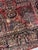 Handmade antique Muiddle Eastern rug in traditional floral design. The rug is from the beginning of 20th century in...