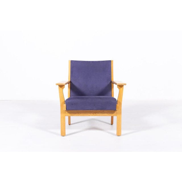 Vintage Scandinavian chair designed by Hans. J. Wegner for Getama. The seat and backrest is upholstered in blue alcantara...