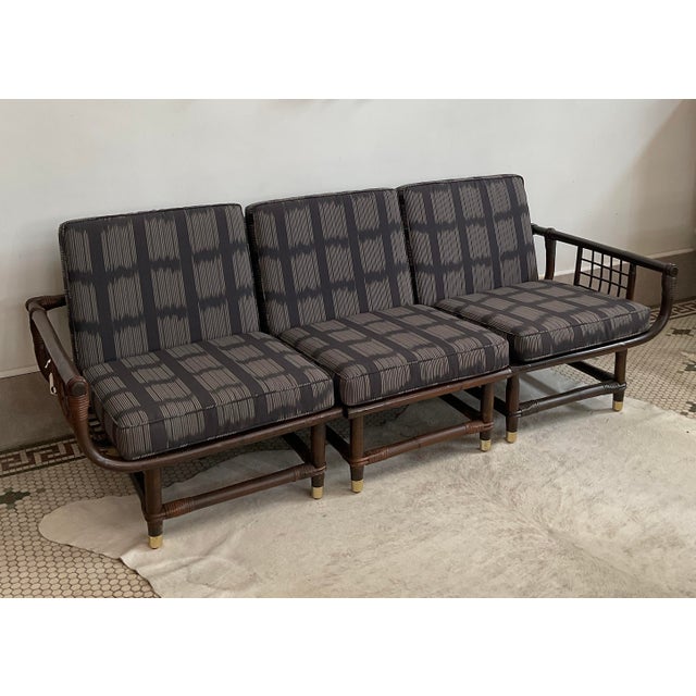 An exceptional find for collectors of high-end mid-century casual and tropical furniture. Cushions newly covered in Romo...