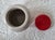 A ceramic French mustard jar or crock, labeled 'Moutarde De Meaux Pommery'. It measures 5 ¼” h x 4” base x 3” at lid. A...