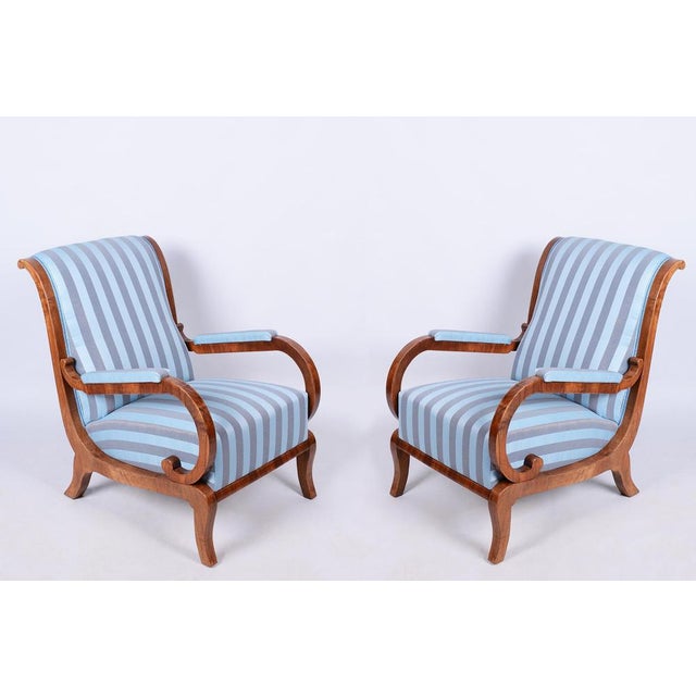 This pair of armchairs is a truly magnificent and refined showcase of high-end bourgeois furniture from the early...