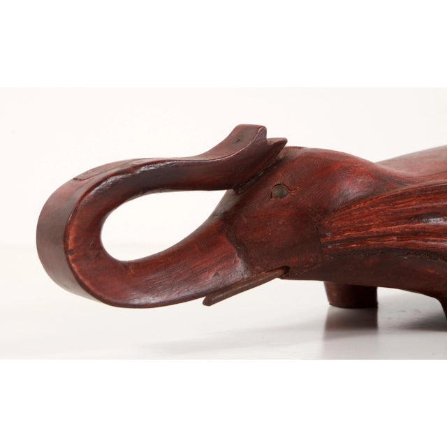 Exceptional vintage carved hardwood opium pillow in the form of an elephant with it's trunk up! Very cool form, unlike...