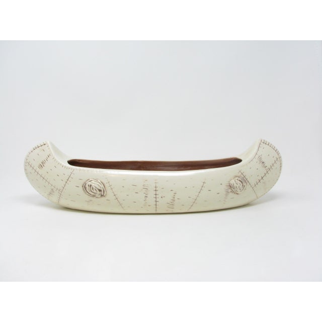 Vintage 1960s Red Wing canoe shaped pottery planter. This was produced as part of the Birch Bark series and is the...