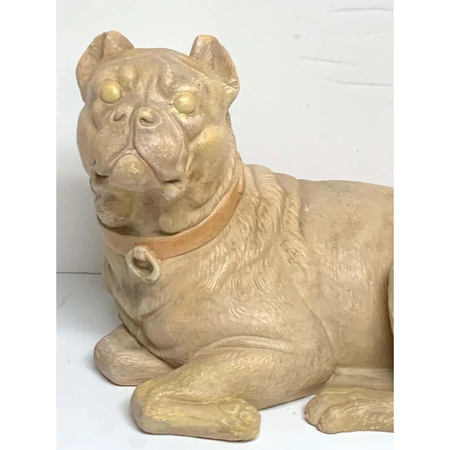 Antique English terracotta recumbent pug dog, realistically modeled and subtly polychromed. Rare form.