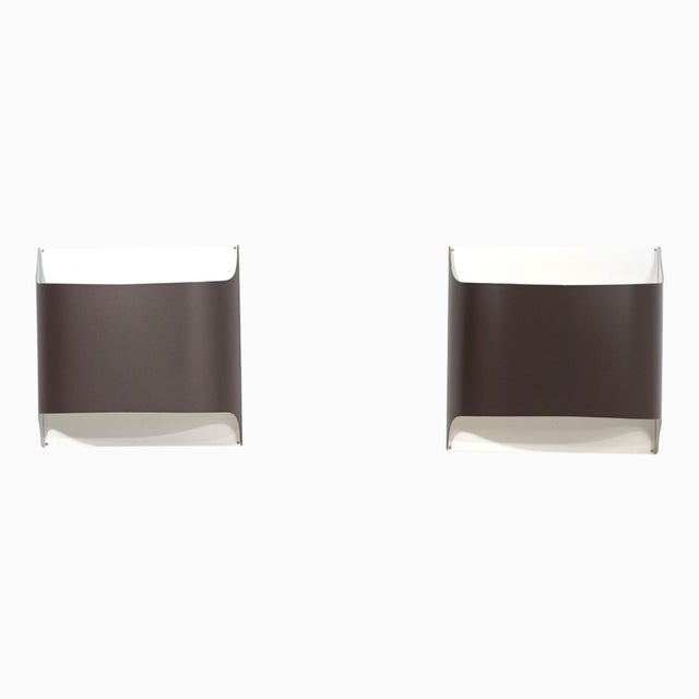 This exceptional pair of wall lights, model 2030/31, was designed by Rolf Krüger and Dieter Witte for the German lighting...