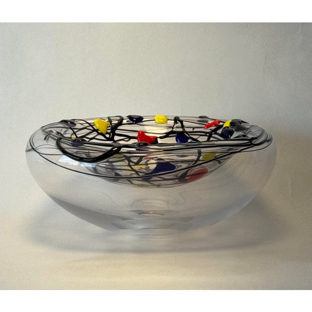The double-walled crystal bowl is decorated using a free-flowing liquid glass technique. This revolutionary method has...