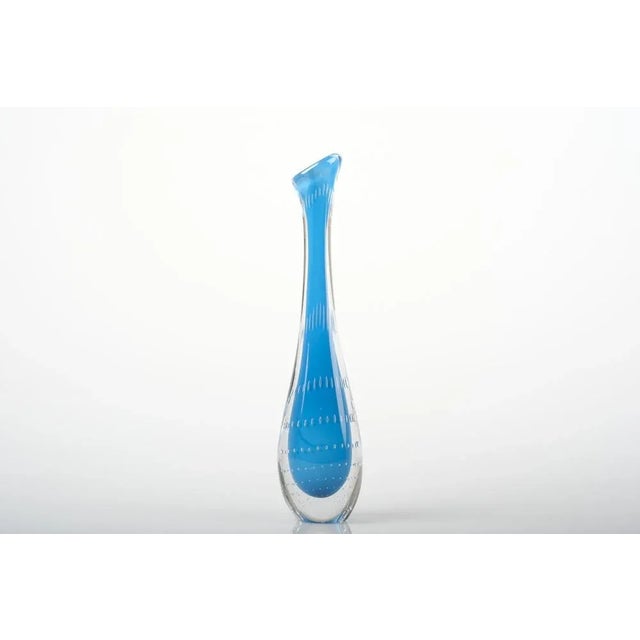 Handmade Swedish glass vase with controlled bubble decor by Vicke Lindstrand for Kosta, 1950s Model: LH 1336 This piece...