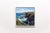 This oil painting captures the rugged coastline of Mutton Cove, where waves crash against the rocky shore under a clear...