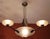 This large pending light with a geometric motive was produced by famous “muller freres luneville” in france in the 1920s....