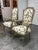 Design Plus Gallery presents a Pair of French Neoclassical Armchairs from the 1930's. The pair showcases tall shaped...
