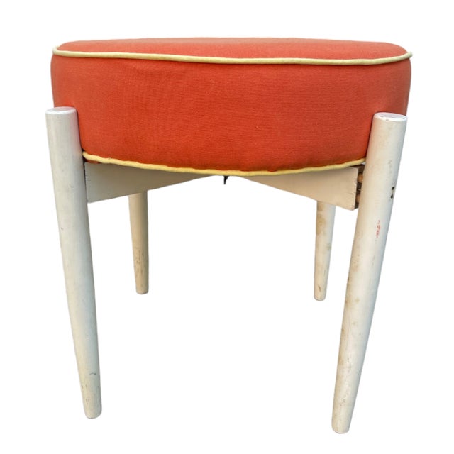 Low chair - stool in the design style of the 1960s and 1970s. Structure made of white lacquered wood, seat with a round...