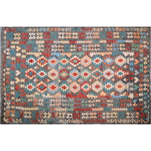 Afghan Maimana hand woven wool flatweave kilim made with organic colors.