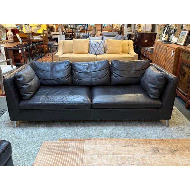 Design Plus Gallery presents a Black Leather Stockholm Sofa by Niels Gammelgaard for IKEA. This sofa has a stylish design,...