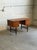 Danish Mid-Century Modern executive desk crafted in warm teak, featuring clean Scandinavian lines and elegant organic...