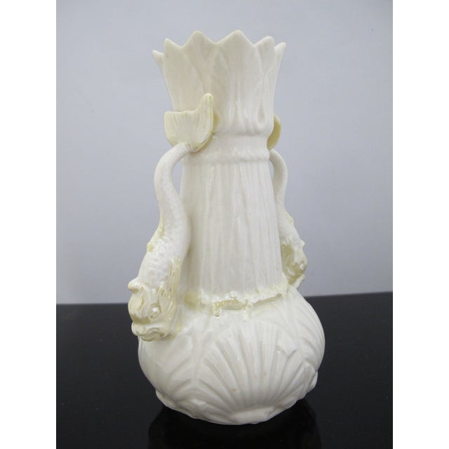 Belleek Parian China "Dolphin Spill Vase". Meticulously crafted in Fermanagh, Ireland featuring distinctive double fish...