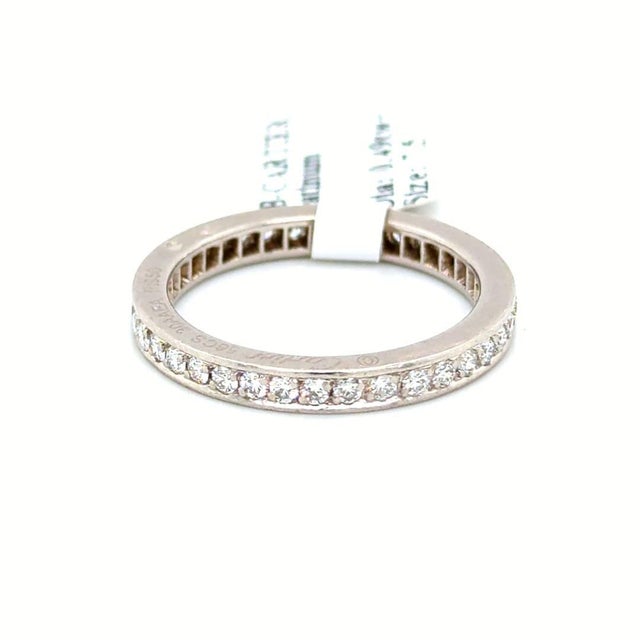 Cartier diamond band ring from the Ballerine collection finely crafted in platinum with channel set round brilliant cut...