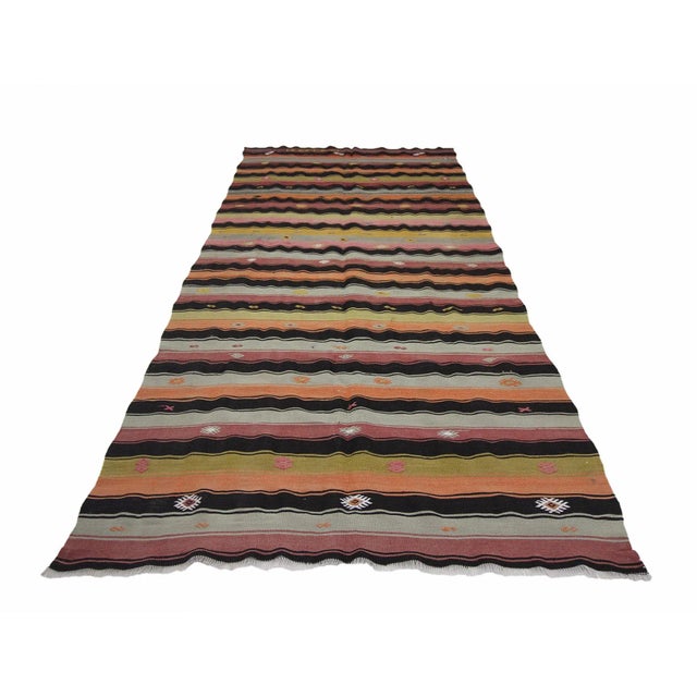 Handwoven vintage kilim rug from Denizli region of Turkey.Approximately 45-55 years old. In good condition.