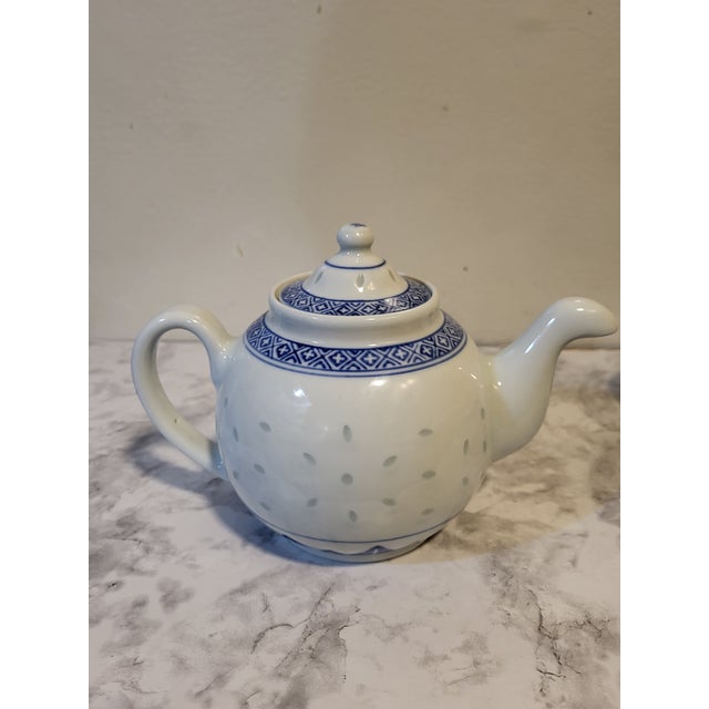 Made in Jingdezhen, China historically known for the production of fine quality porcelain. Translucent when held to the...
