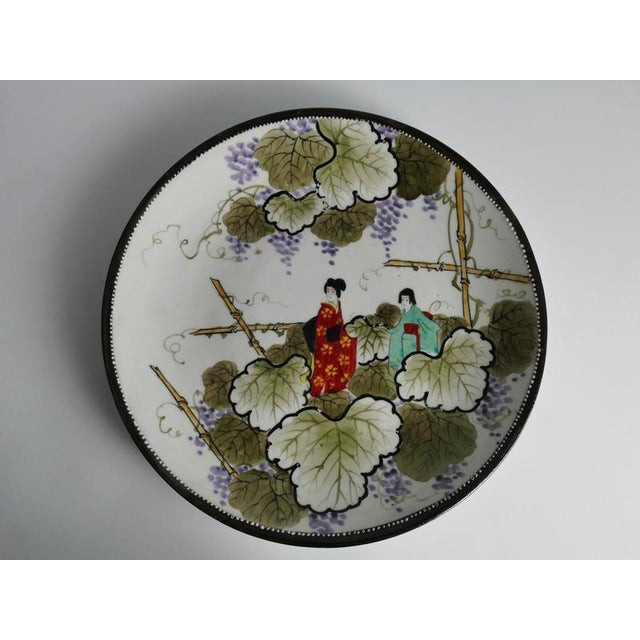 Meiji Hand-Painted Kutani Porcelain Charger with Women and Vine Arbor, 1920s For Sale - Image 16 of 18
