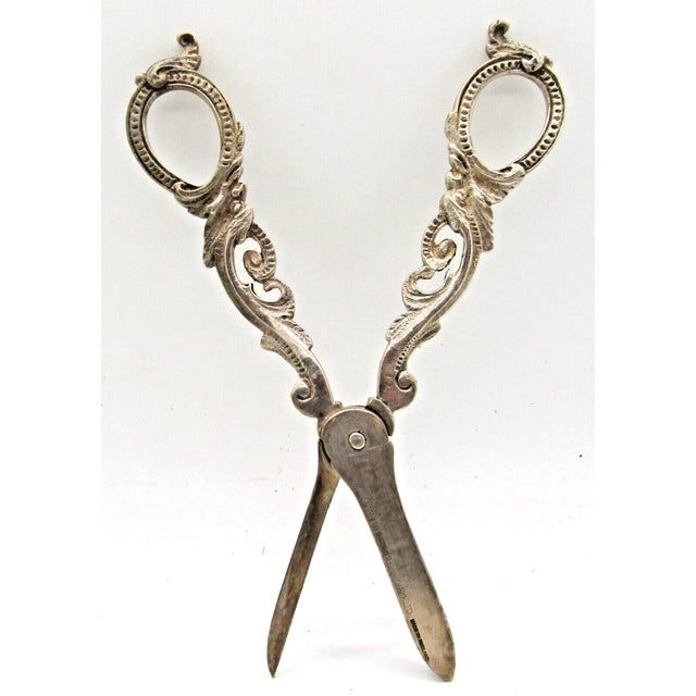 Antique Hampton Utilities (Birmingham) LTD Grapevine Pattern Scissors Measures 6 1/4" long and 2 1/8" wide.