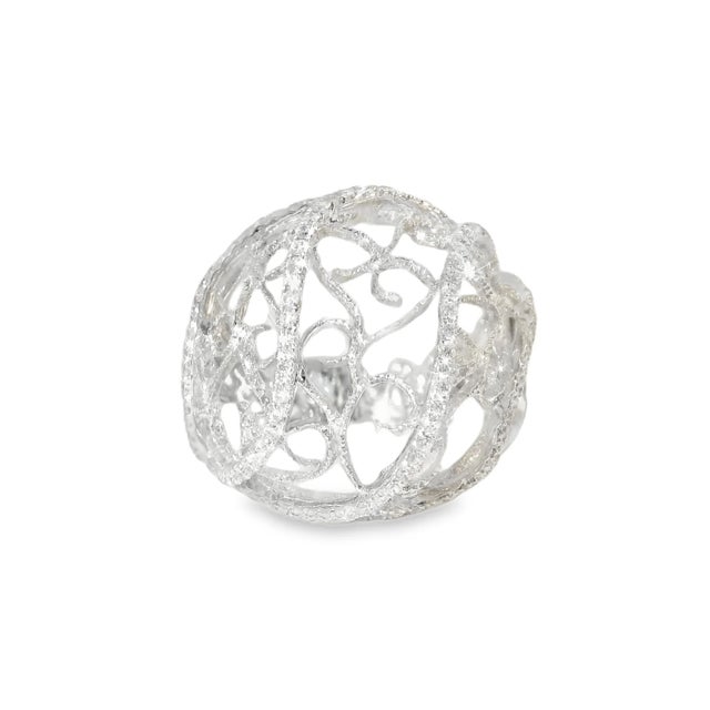Exquisite 18K white gold filigree scroll band ring featuring numerous brilliant round diamonds totaling 0.8 carats. Estate...