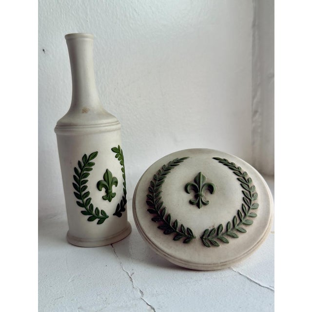 Vintage Italian ceramic vanity set, mid-century (1950s–1960s), including a bud vase and lidded trinket box. Matte white /...