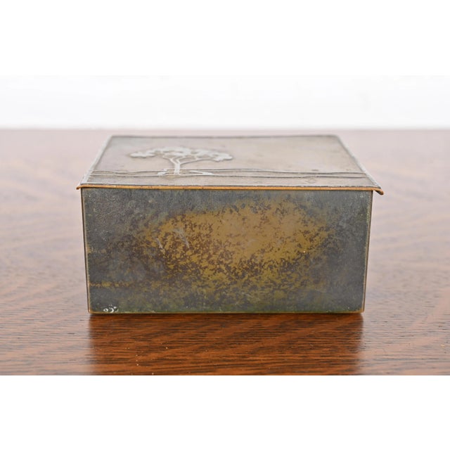 A gorgeous Arts & Crafts period humidor or cigarette box By Heintz Art Metal Shop USA, Early 20th Century Sterling silver...