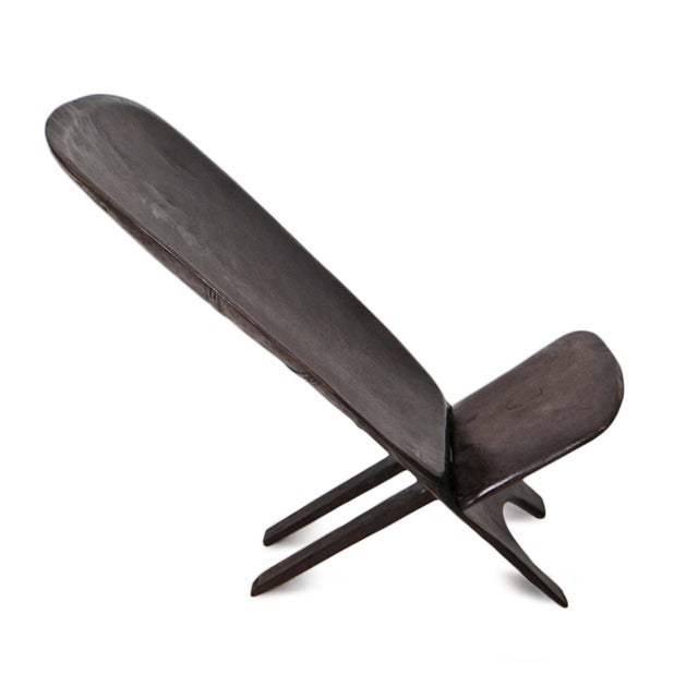 Wonderful and simple Senufo stargazer solid wood folding chair. From the Senufo people of Western Africa. Hand carved...
