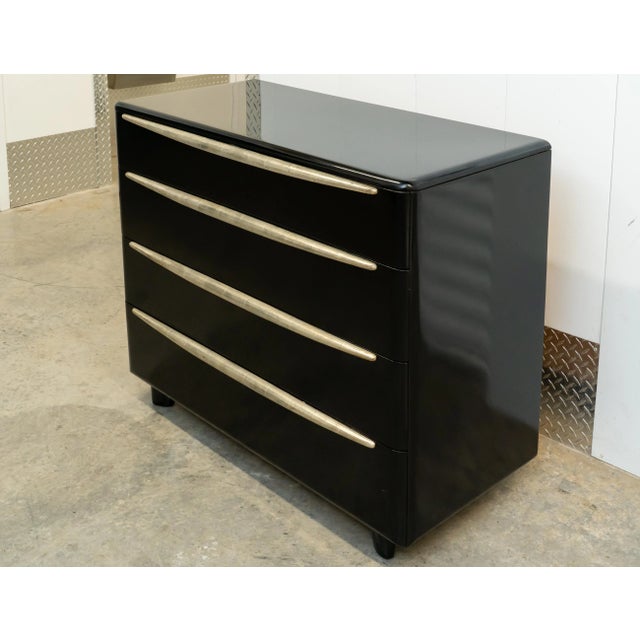 The Capellini Black Dresser is a sculptural statement of modern design, balancing bold geometry with minimalist...