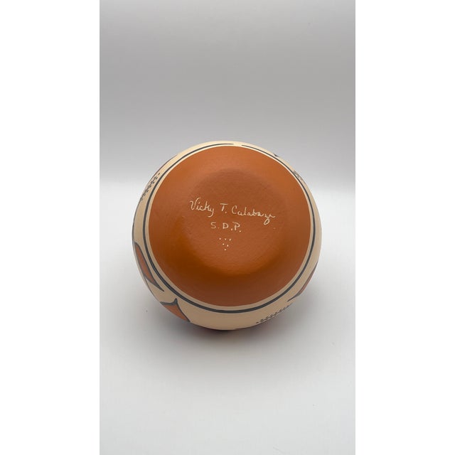 This exceptional polychrome jar is the work of Vicky Tenorio Calabaza, a renowned potter from the Kewa Pueblo (formerly...