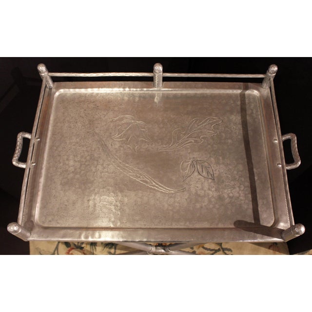 Circa 1940s Hollywood Regency cocktails tray & folding stand. Designed by Mary Wright for Everlast Metal Products. Gallery...