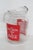 This gorgeous Beverage Pitcher is made of clear glass. This striking pitcher has a classic vintage design from the 1970s;...