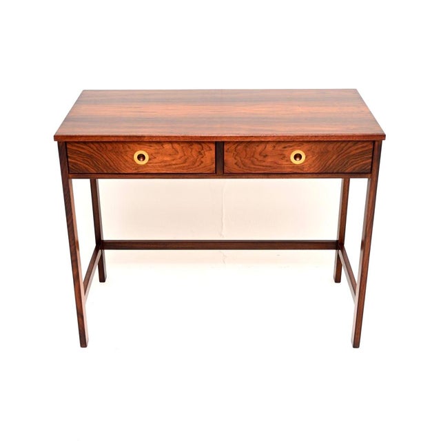 A stunning vintage console table / desk, made in England and dating from the 1960’s. It is of superb quality with an...